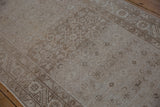 Textured Herati pattern field and muted abrashes on a distressed Hamadan runner.
