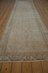 Textured pile of vintage distressed Hamadan runner, featuring Herati design and powder blue motifs.