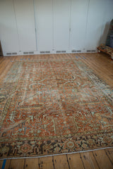 Distressed vintage Mehrivan rug, geometric vines in pale terracotta, and Samovar Turtle border.