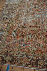 Distressed Mehrivan carpet, geometric vines, serrated leaves, Samovar Turtle border in terracotta and dusty blue.