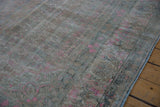 Heavy color abrashes and even wear to the knot heads on a vintage distressed Bijar carpet pile.