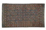 Vintage distressed Afghani Belouch rug, geometric elephant footprint medallions in chestnut, olive green, dusty cobalt, 3'7