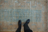 Distressed vintage Afghani Belouch rug, geometric guls, wide border, pale blue and terracotta.