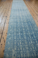 Aged texture and time-softened powder blue boteh pattern on this Hamadan runner.