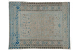 Distressed hand-knotted Afshar square rug, blue and silver geometric medallion, brown borders.