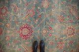 Evenly worn low pile texture on a vintage Persian Yezd carpet with scrolling palmettes.