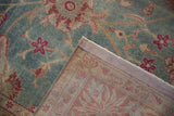 Reverse view of the vintage Yezd carpet's hand-knotted construction and tidy side selvedge.
