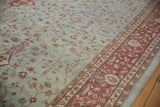 Distressed vintage Mahal carpet pile, highlighting dusty powder blue vinery and wine burgundy border.