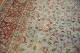 Distressed Mahal carpet with dusty powder blue field, delicate vinery, wine burgundy border, and even wear.