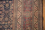 Dusty wine red Samovar turtle design border and Herati field on vintage Tabriz carpet.