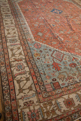 Stepped transition from madder red to powder blue on the field of a late 19th-century Bakshaish carpet.
