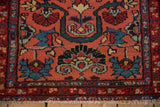 Vintage Mehreban rug detail: terracotta field, sky blue floral blossoms, cloud band, and fringe.