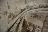 Close view of the hand-knotted texture and short pile on a vintage Turkish rug.