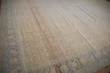 Distressed vintage Tabriz rug detail, allover Herati design, soft beige and blue.