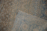 Distressed beige and blue Herati pile and fine knotted foundation of a vintage Tabriz carpet.