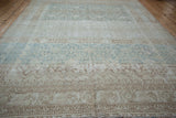 Vintage distressed Malayer carpet with textured wear and dynamic ivory, blue, and beige abrashes.