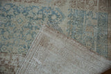 Vintage Malayer carpet's hand-knotted foundation, intact selvage, and distressed ivory, blue pile.