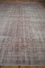 Distressed pile of the vintage Sparta rug revealing original foundation and worn knot heads.