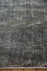 Textural detail of overdyed Sparta rug, showing wear to foundation in teal and charcoal.