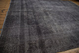Overdyed vintage Turkish Sparta carpet, distressed charcoal and dark navy pile with wear.