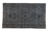 Vintage overdyed Turkish Sparta rug, distressed allover floral in slate blue, coffee brown, and turquoise.