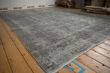 Patina and faded curvilinear patterns on vintage Persian Meshed carpet.