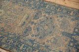 Even wear down to the knot heads reveals the texture of this vintage Karaja runner's geometric design.