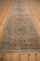 Vintage Distressed Serab runner with repeating medallions and pawn motif border in muted tones.