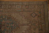 Vintage Serab runner's reciprocating pawn border with distressed texture and faint aqua, pink hues.