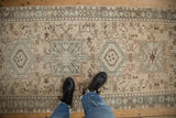 Distressed vintage Karaja runner with geometric patterns, subtle abrashes, and even pile wear.