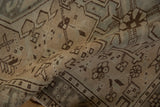 Distressed vintage Karaja runner pile detail, with worn beige, brown geometric motifs and slate blue.