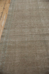 Distressed texture and time-softened abrashes on a vintage Persian Hamadan rug runner.