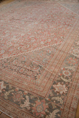 Distressed Mahal rug corner: palmette border, pawn motif, and inverted corner spandrels in terracotta, slate, and beige.