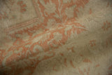 A soft fold in the vintage Kayseri carpet reveals its fine, hand-knotted texture and low pile.