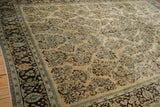 Angled corner view of a vintage Arak rug highlighting the distressed texture and dark chocolate brown border.