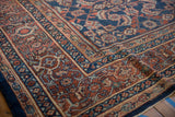 Vintage Mahal carpet corner, terracotta and dark denim blue borders with mahi-mahi Herati pattern.