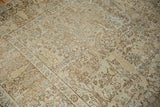 Worn pile and exposed foundation showing the forest design on a vintage Tabriz carpet.