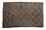 Distressed hand woven Turkish Jijim carpet, geometric diamond lattice in charcoal and time-softened silver.