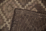 Vintage Distressed Jijim carpet corner with geometric patterns, original selvage, and woven main border on reverse.