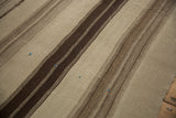 Patchwork Turkish Kilim showcasing horizontal bands of greige, silver, and chocolate brown.