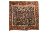 Vintage Oushak square carpet, dark charcoal field, delicate vinery, copper and ivory floral border.