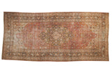 Distressed Persian Doroksh carpet, shield medallion, vinery, raspberry, charcoal, ivory tones. 8'1