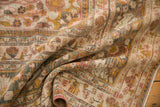 Distressed Doroksh carpet pile, revealing dusty raspberry, saffron, and charcoal hues.