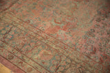 Vintage Persian Mahal border with dusty blush, teal floral pattern, and low distressed pile.