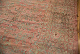 Distressed vintage Mahal carpet, with worn dusty rose, teal florals and time-softened tones.