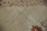 Even wear to the knot heads and visible speckling on the distressed Tabriz carpet's field.