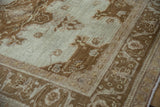 Evenly worn pile and knot heads on the corner of a vintage distressed Oushak rug.