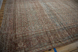 Distressed Mahal carpet's worn pile, allover henna plant motif, and Turtle Samovar border.