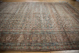 Distressed Persian Mahal carpet border featuring classic Turtle Samovar motifs and dusty tones.