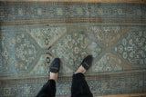 Vintage Distressed Malayer runner with powder blue Herati field and brown floral border.